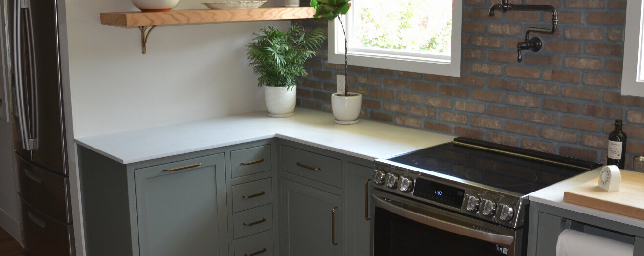 stove with custom made cabinets and drawers made by renovacraft