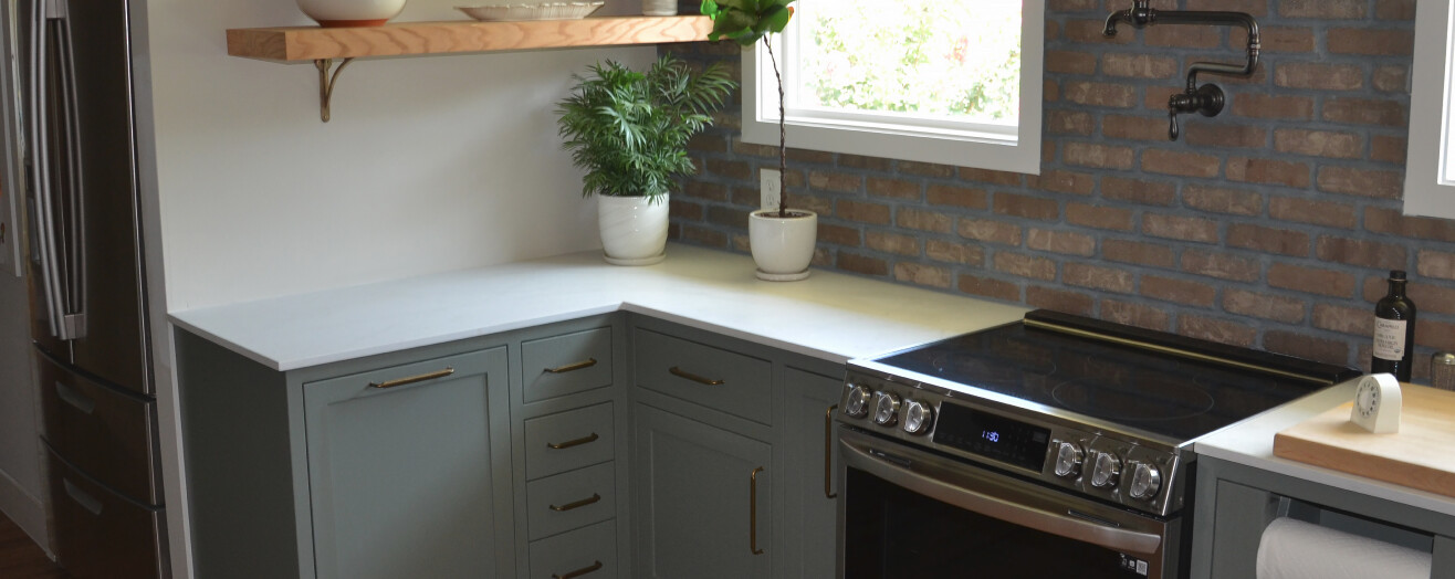 stove with custom made cabinets and drawers made by renovacraft